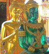 Buddhas in gold and emerald