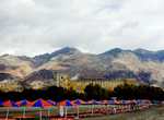 Frangokastello - Beach Umbrellas, Fort, Mountains.  Cloudy and windy - not a good beach day. (749x550, 104.3 kilobytes)