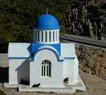 In the mountains, near Strovles, we passed this chapel.  Plenty of goats waiting by the chapel and at the road to be fed, but not a person to be seen. (492x440, 85.4 kilobytes)