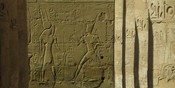 On a wall of the Hall, Pharaoh performs the <em>heb-set</em> jubilee ritual.
