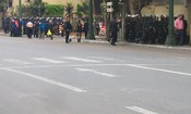 Traffic is stopped while the riot police assemble