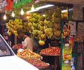 Fruit in a real store - with sign, lights, walls.