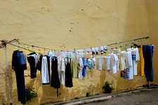 Khoo Kongsi <br>Clothes hang in the entrance street. (770x514, 75.4 kilobytes)