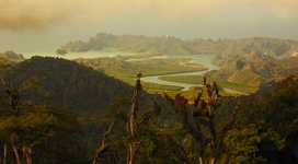 The Tanjung Rhu Hotel is on the near side of the river, below and to the left of the tower.  Picture taken from Gunung Raya, Lankawi's highest mountain at 2800 ft. (770x424, 190.9 kilobytes)