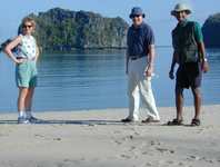 Patrick leads this British couple and us on the Mangrove Tour.  We took a boat up the tidal stream to where the mangroves grow in salt water. (1181x894, 683.4 kilobytes)