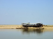 Drydocked on a sandbar until the rainy season.