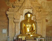 A modern Buddha framed by modern stucco in Htilomino