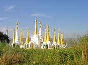 Brightly gilded stupas on Inle Lake