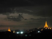 Finally, the view from our hotel: Shwedagon and another lesser pagoda.