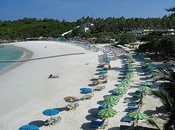 Batok Beach.  The white buildings are The Racha