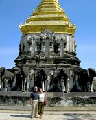 Max, Gloria, and elephants at the base of the chedi