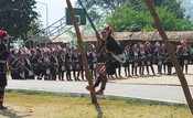 A swing was in use at this plot, and many Akha were there to prepare.