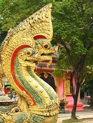 Three-headed Naga (serpent) decorates the Wat