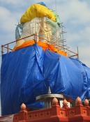 At Sob Ruak, they're using some of the tourist money to build a huge Buddha